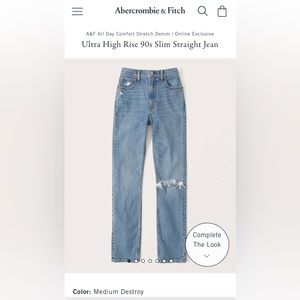 Medium washed 90s slim straight ultra high rise jeans.